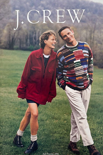 red sweater, multicoloured sweater, boy and girl laughing